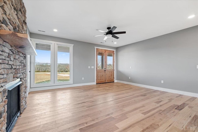4615 Everett Rd, Forest, VA 24551 - unfurnished living room featuring ceiling fan, baseboards, light wood-type flooring, recessed lighting, and a fireplace