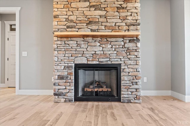 4615 Everett Rd, Forest, VA 24551 - interior details with a fireplace, wood finished floors, and baseboards