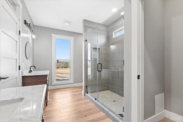 4615 Everett Rd, Forest, VA 24551 - bathroom featuring baseboards, a stall shower, wood finished floors, and vanity