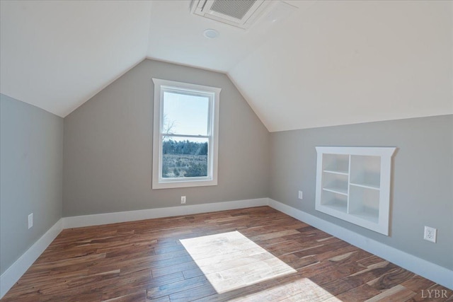 4615 Everett Rd, Forest, VA 24551 - additional living space featuring baseboards, visible vents, wood finished floors, and vaulted ceiling