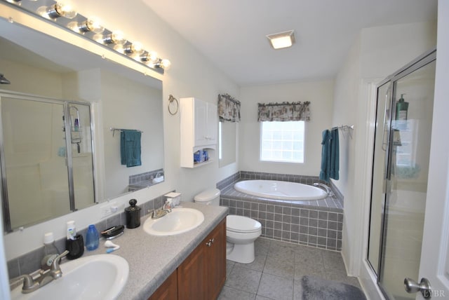 2453 Easome Rd, Hurt, VA 24563 - full bath featuring tile patterned floors, a shower stall, a bath, double vanity, and toilet