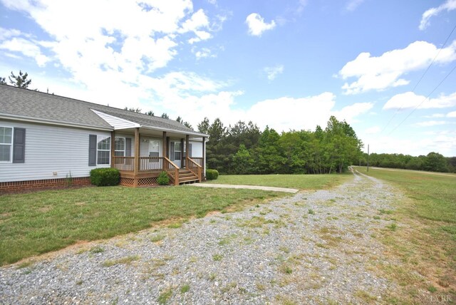 2453 Easome Rd, Hurt, VA 24563 - view of front of house featuring covered porch, a front lawn, and roof with shingles