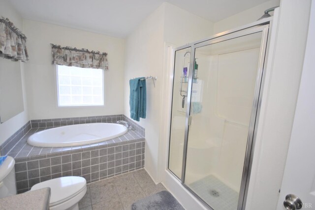2453 Easome Rd, Hurt, VA 24563 - full bathroom with toilet, tile patterned flooring, a shower stall, and a garden tub