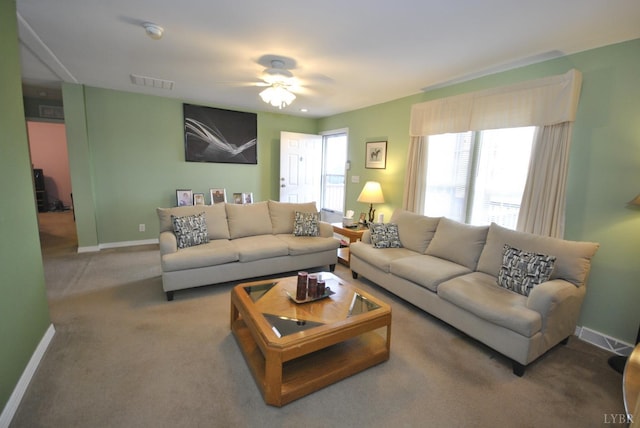 2453 Easome Rd, Hurt, VA 24563 - carpeted living area featuring baseboards and a ceiling fan