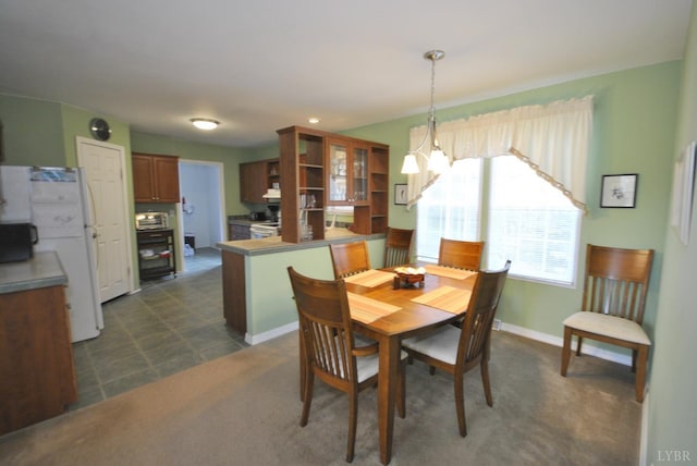2453 Easome Rd, Hurt, VA 24563 - dining room featuring baseboards and dark colored carpet