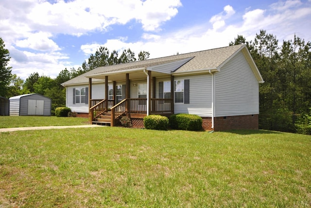 2453 Easome Rd, Hurt, VA 24563 - ranch-style house featuring covered porch, a storage shed, crawl space, an outdoor structure, and a front lawn