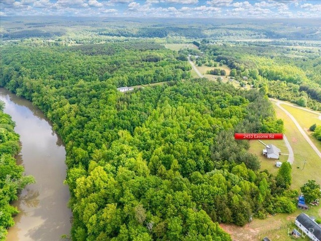 2453 Easome Rd, Hurt, VA 24563 - drone / aerial view of a forest and a nearby body of water