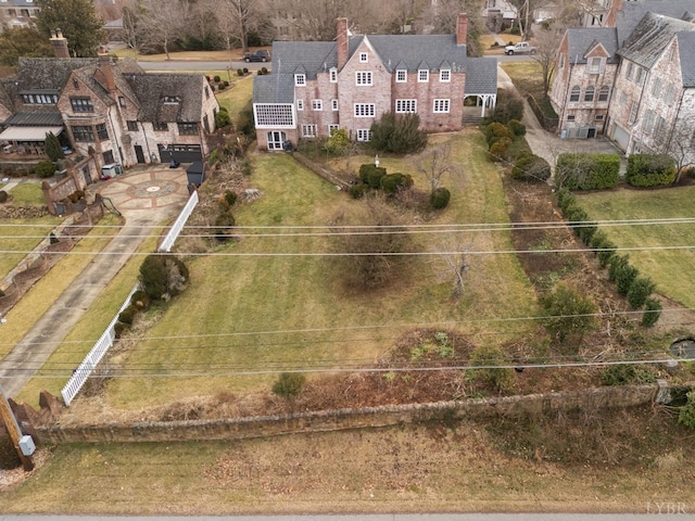 birds eye view of property with a residential view