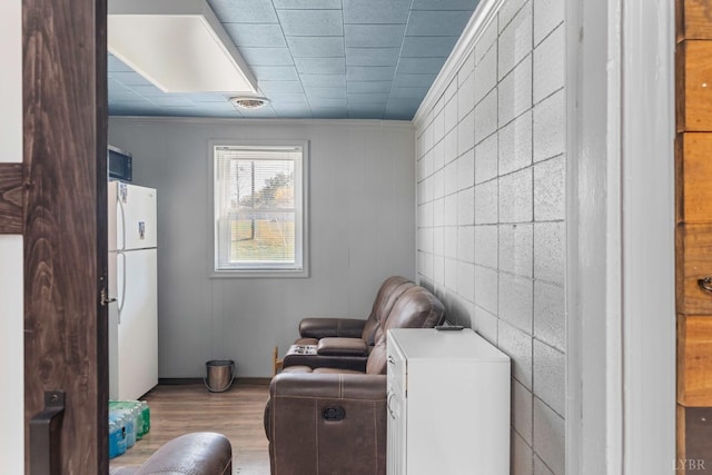273 Riverbend Rd, Altavista, VA 24517 - sitting room with visible vents, tile walls, and wood finished floors