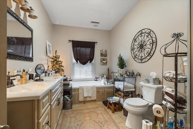 1670 Church St, Appomattox, VA 24522 - bathroom with vanity, a bath, tile patterned floors, and toilet