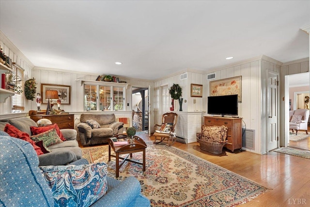 1670 Church St, Appomattox, VA 24522 - living room with crown molding and light hardwood / wood-style floors