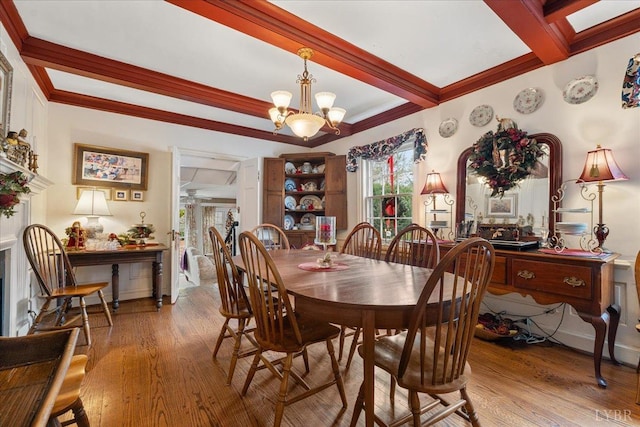 1670 Church St, Appomattox, VA 24522 - dining space with an inviting chandelier, ornamental molding, beam ceiling, and light hardwood / wood-style flooring