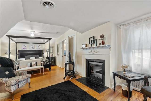 1670 Church St, Appomattox, VA 24522 - living room with light hardwood / wood-style floors and ceiling fan