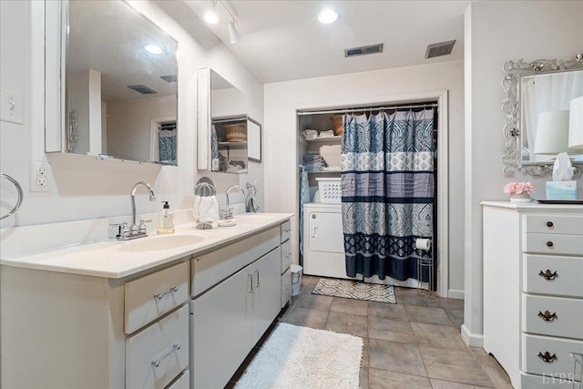 1670 Church St, Appomattox, VA 24522 - bathroom with vanity and washer / clothes dryer
