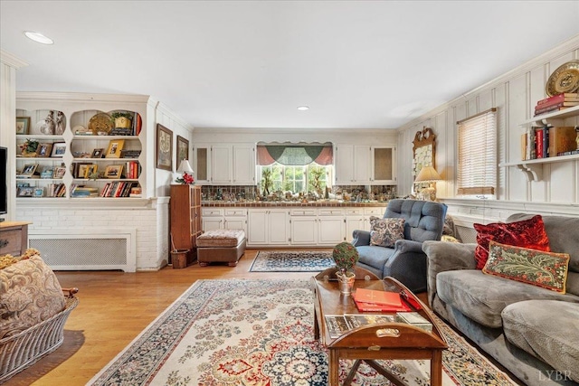 1670 Church St, Appomattox, VA 24522 - living room with light hardwood / wood-style flooring and ornamental molding