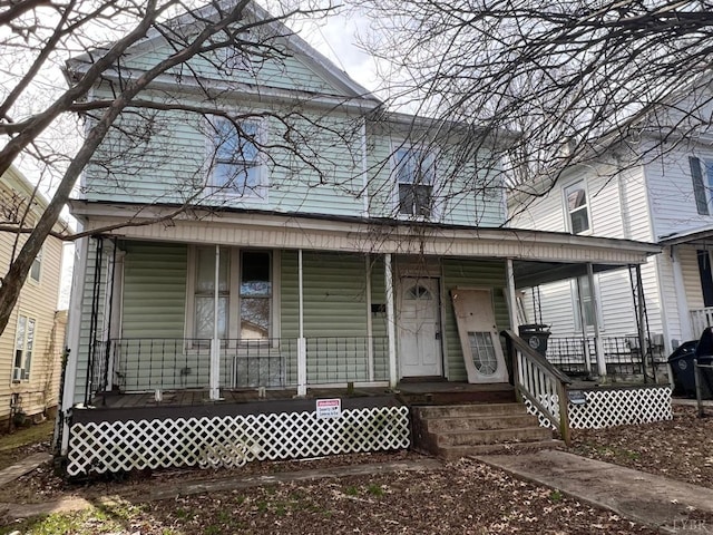 1711 Floyd St, Lynchburg, VA 24501 - shotgun-style home with covered porch