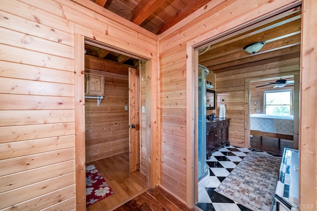 2766 Camden Rd, Big Island, VA 24526 - bathroom featuring wood-type flooring, vanity, wooden ceiling, and wood walls