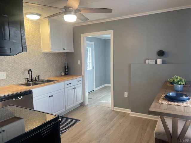 1103 Brandon Rd, Lynchburg, VA 24502 - kitchen with white cabinets, a sink, crown molding, and dishwasher