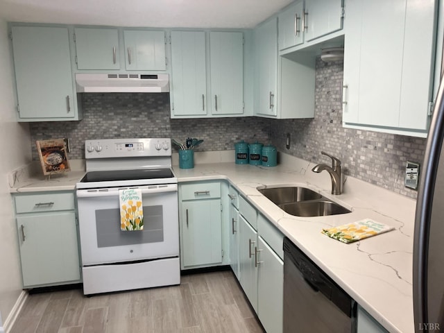 34 Cape Point Ct, Lynchburg, VA 24502 - kitchen featuring a sink, light wood-style flooring, stainless steel appliances, decorative backsplash, and under cabinet range hood