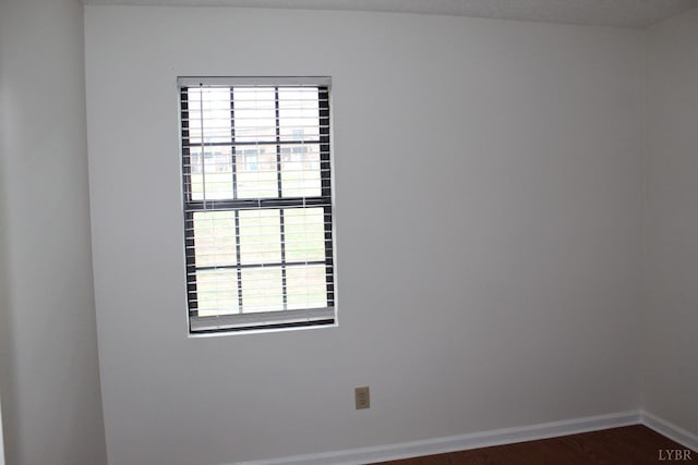 34 Cape Point Ct, Lynchburg, VA 24502 - empty room with baseboards, dark wood-style flooring, and a healthy amount of sunlight
