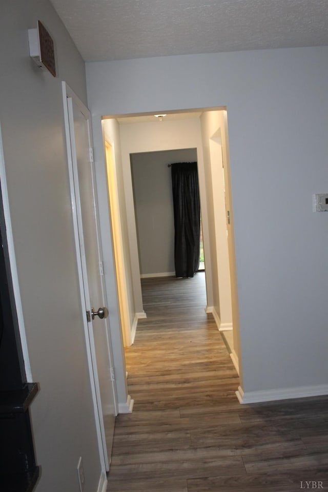 34 Cape Point Ct, Lynchburg, VA 24502 - corridor with baseboards, a textured ceiling, and dark wood finished floors