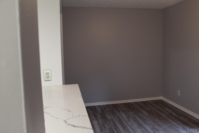 34 Cape Point Ct, Lynchburg, VA 24502 - spare room with a textured ceiling, baseboards, and dark wood-type flooring