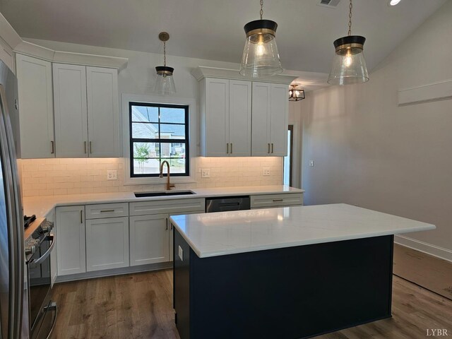 18 Grandset Dr, Forest, VA 24551 - kitchen featuring black appliances, a sink, backsplash, a center island, and dark wood-style floors