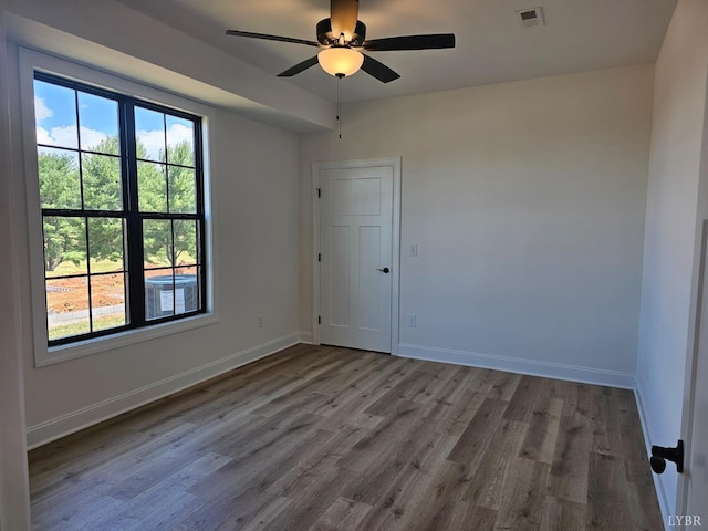 18 Grandset Dr, Forest, VA 24551 - unfurnished room featuring wood finished floors, baseboards, and a ceiling fan