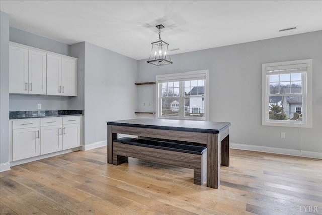 1270 Hupps Hill Ln, Forest, VA 24551 - dining space featuring light wood finished floors, plenty of natural light, and baseboards