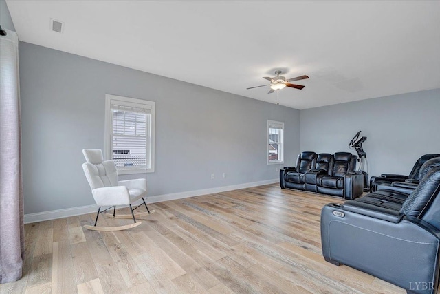 1270 Hupps Hill Ln, Forest, VA 24551 - living room with ceiling fan, light wood finished floors, and baseboards