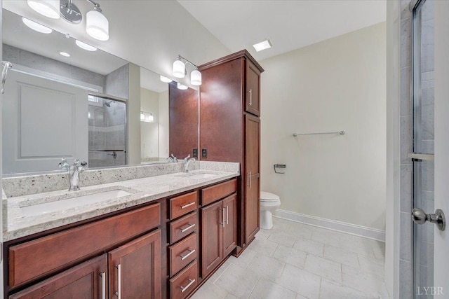 1270 Hupps Hill Ln, Forest, VA 24551 - full bathroom with toilet, double vanity, baseboards, a tile shower, and tile patterned flooring