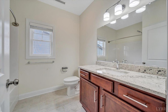 1270 Hupps Hill Ln, Forest, VA 24551 - full bath featuring baseboards, vanity, toilet, and plenty of natural light