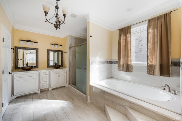 1060 Governors Ln, Forest, VA 24551 - full bath with a stall shower, a garden tub, a chandelier, vanity, and ornamental molding