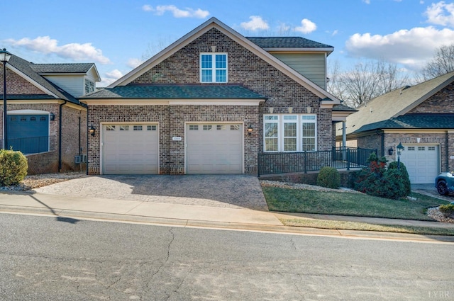 1060 Governors Ln, Forest, VA 24551 - traditional home featuring driveway, brick siding, an attached garage, and a shingled roof