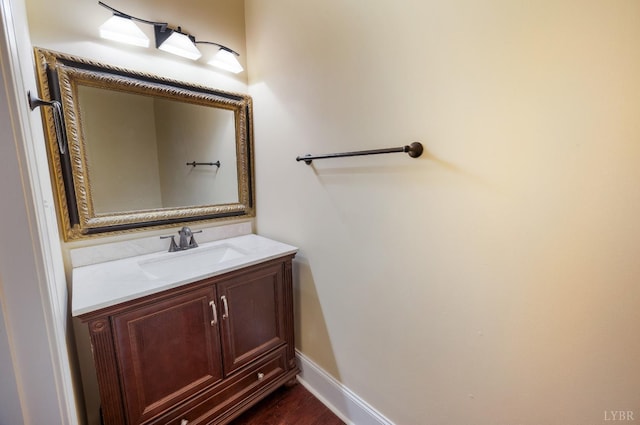 1060 Governors Ln, Forest, VA 24551 - bathroom with vanity, wood finished floors, and baseboards