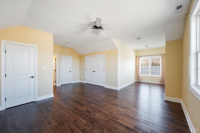 1060 Governors Ln, Forest, VA 24551 - unfurnished living room featuring vaulted ceiling, dark wood-type flooring, ceiling fan, and baseboards