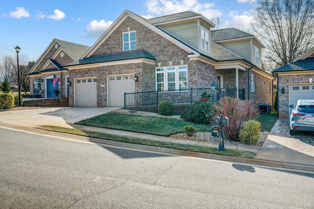 1060 Governors Ln, Forest, VA 24551 - view of front of house featuring driveway, brick siding, a porch, and a garage