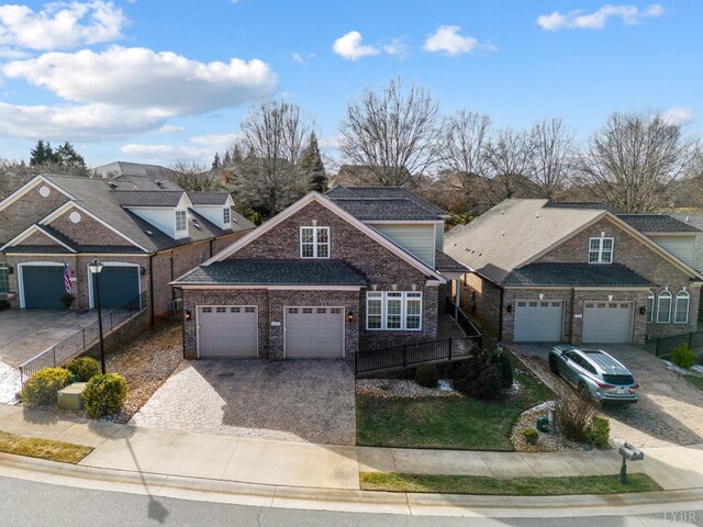 1060 Governors Ln, Forest, VA 24551 - view of front of home featuring decorative driveway, a garage, brick siding, fence, and roof with shingles