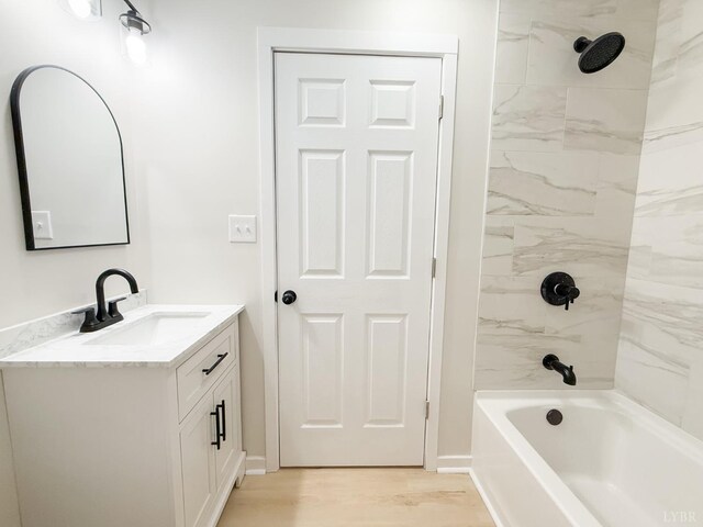 13273 Leesville Rd, Lynch Station, VA 24571 - full bathroom featuring wood finished floors, shower / bath combination, and vanity