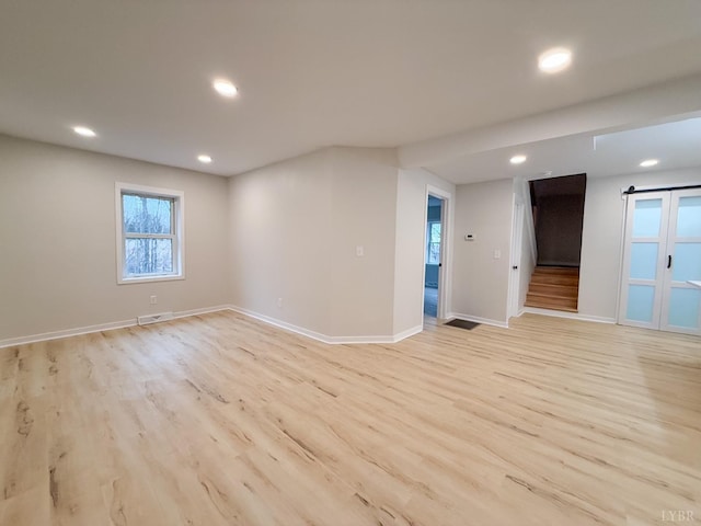 13273 Leesville Rd, Lynch Station, VA 24571 - unfurnished room featuring recessed lighting, stairway, visible vents, light wood-style floors, and baseboards