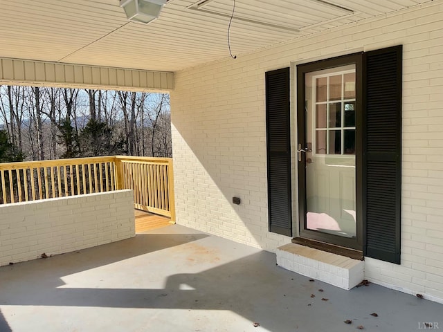 143 Lake Dr, Amherst, VA 24521 - doorway to property featuring a patio area and brick siding