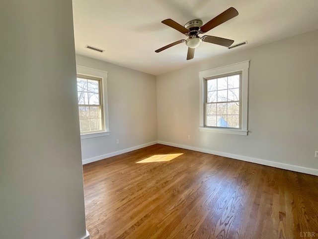 143 Lake Dr, Amherst, VA 24521 - empty room featuring baseboards, wood finished floors, and a ceiling fan