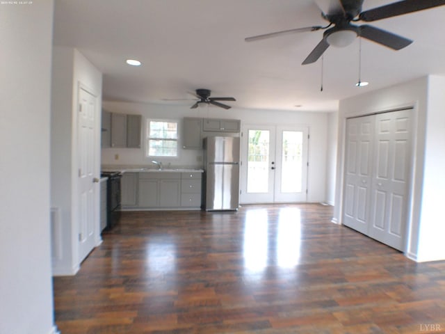 192 Main St, Madison Heights, VA 24572 - unfurnished living room featuring ceiling fan, french doors, a sink, dark wood finished floors, and recessed lighting