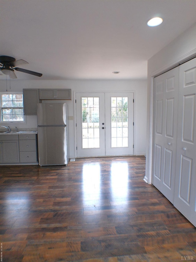 192 Main St, Madison Heights, VA 24572 - unfurnished living room featuring plenty of natural light, french doors, a ceiling fan, recessed lighting, and dark wood-style floors