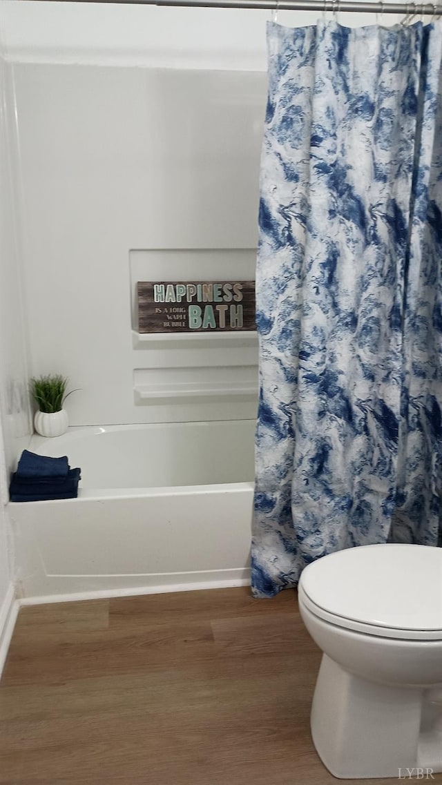 192 Main St, Madison Heights, VA 24572 - bathroom featuring wood finished floors, toilet, and baseboards