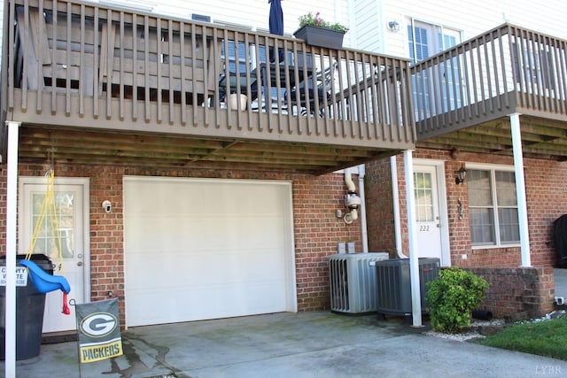 224 Duncraig Dr, Lynchburg, VA 24502 - garage featuring concrete driveway and central AC unit
