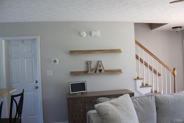 224 Duncraig Dr, Lynchburg, VA 24502 - living room featuring a textured ceiling and stairway