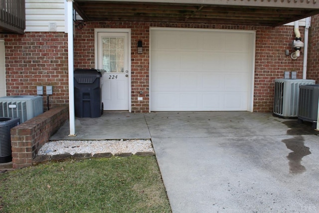 224 Duncraig Dr, Lynchburg, VA 24502 - garage featuring driveway and cooling unit