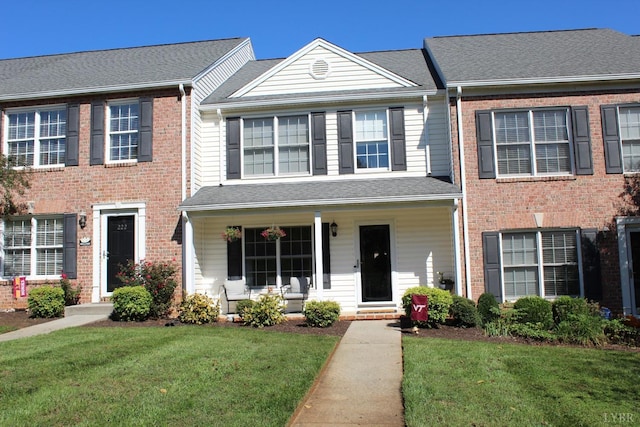 224 Duncraig Dr, Lynchburg, VA 24502 - townhome / multi-family property with a front yard, a porch, and brick siding