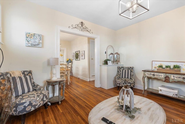 211 Warren Ave, Lynchburg, VA 24501 - sitting room featuring a chandelier, baseboards, and wood finished floors